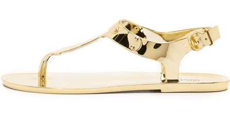 michael michael kors plate jelly sandals gold|Michael Kors flat sandals dsw.